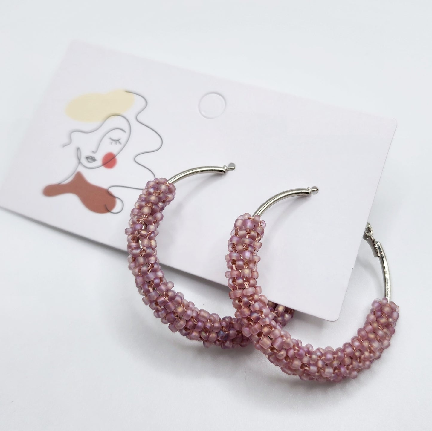 Beaded hoop earrings under $20 ASSORTED COLORS